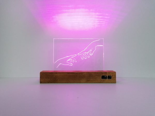 love-creation-hand-touching-pink-lamp